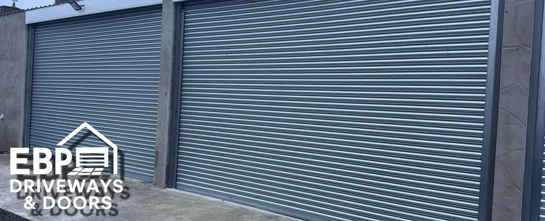 Garage door installers in North Wales fitting roller and sectional garage doors